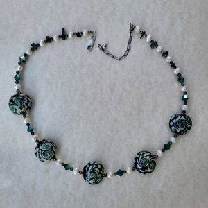Green and white beaded necklace
